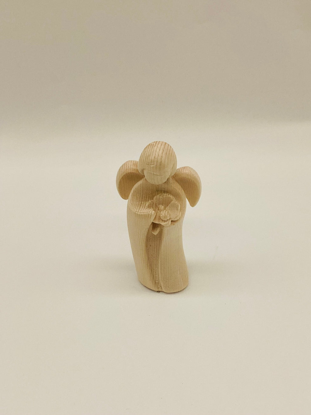 Zirbenengel mit Blume